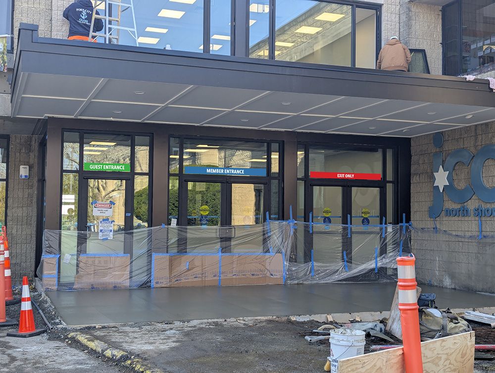 3/20: Mockup of sigage on new entrance doors