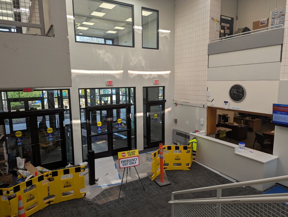 3/24: New entrance doors and Welcome desk, as seen from lobby