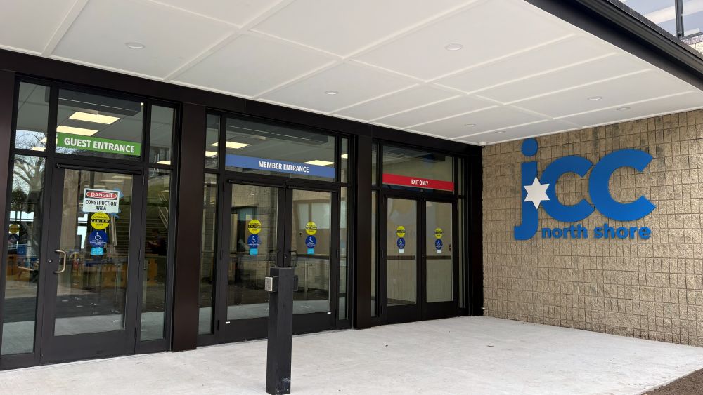 3/30: The new entrance doors as seen from the exterior, with Guest entrance on the left, Member entrance in the center, and Exit doors on the right.